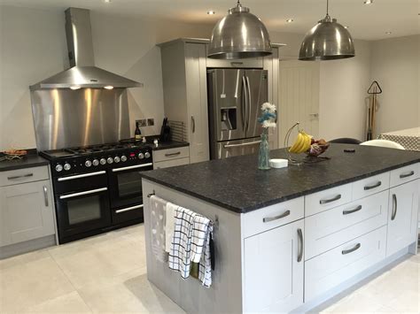 grey cabinets with island cooktop steel knobs|grey kitchen cabinets.